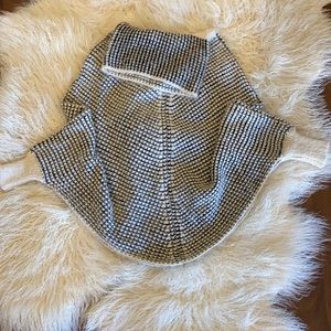 Houndstooth snugly poncho.